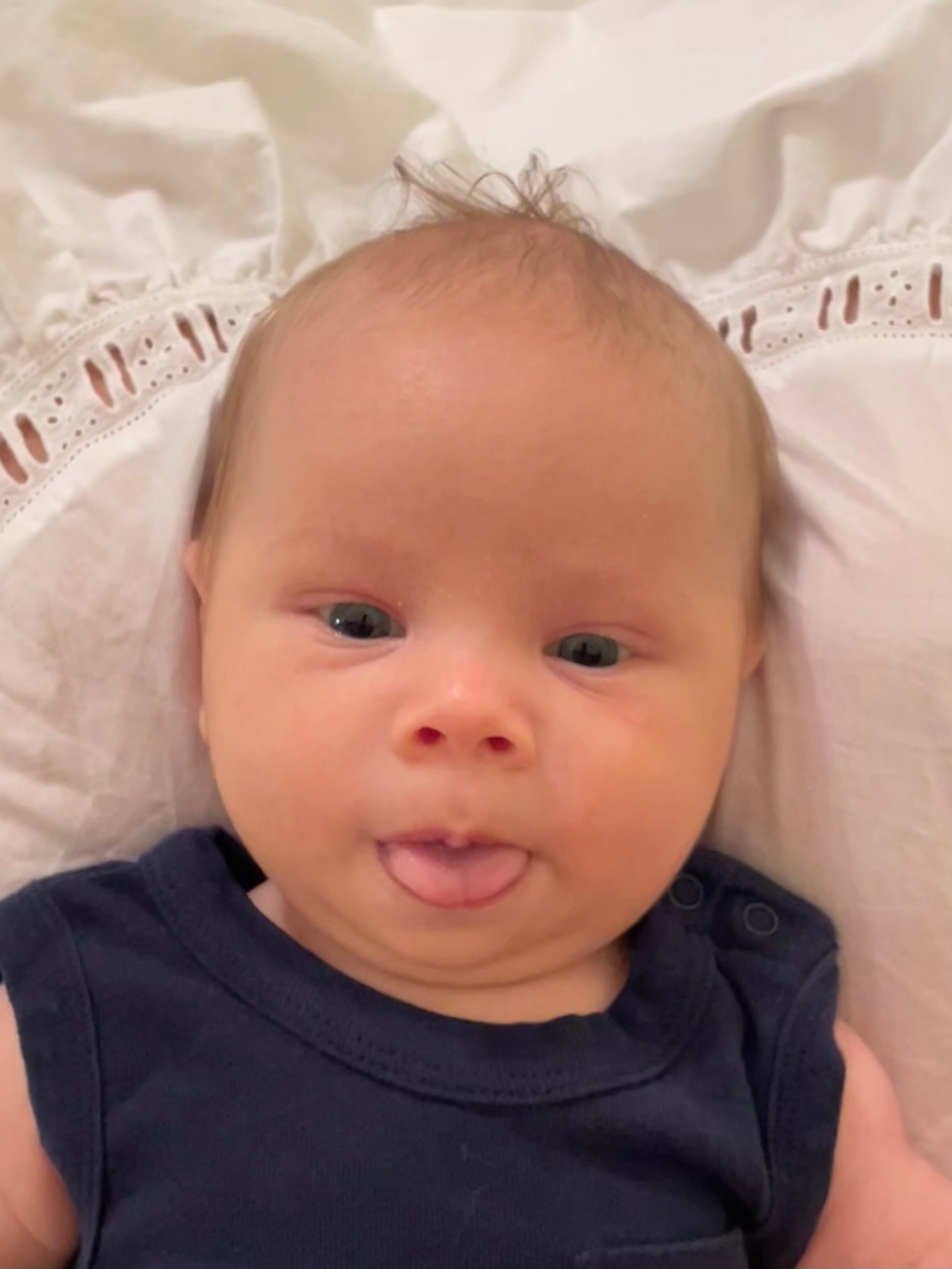 Close-up of Oren sticking out his tongue